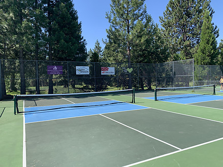 shade at the end of a pickleball court